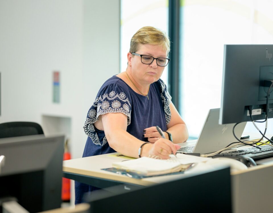 a person sitting at a desk